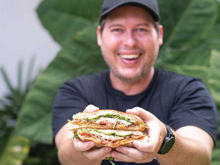 Man holding sandwich 