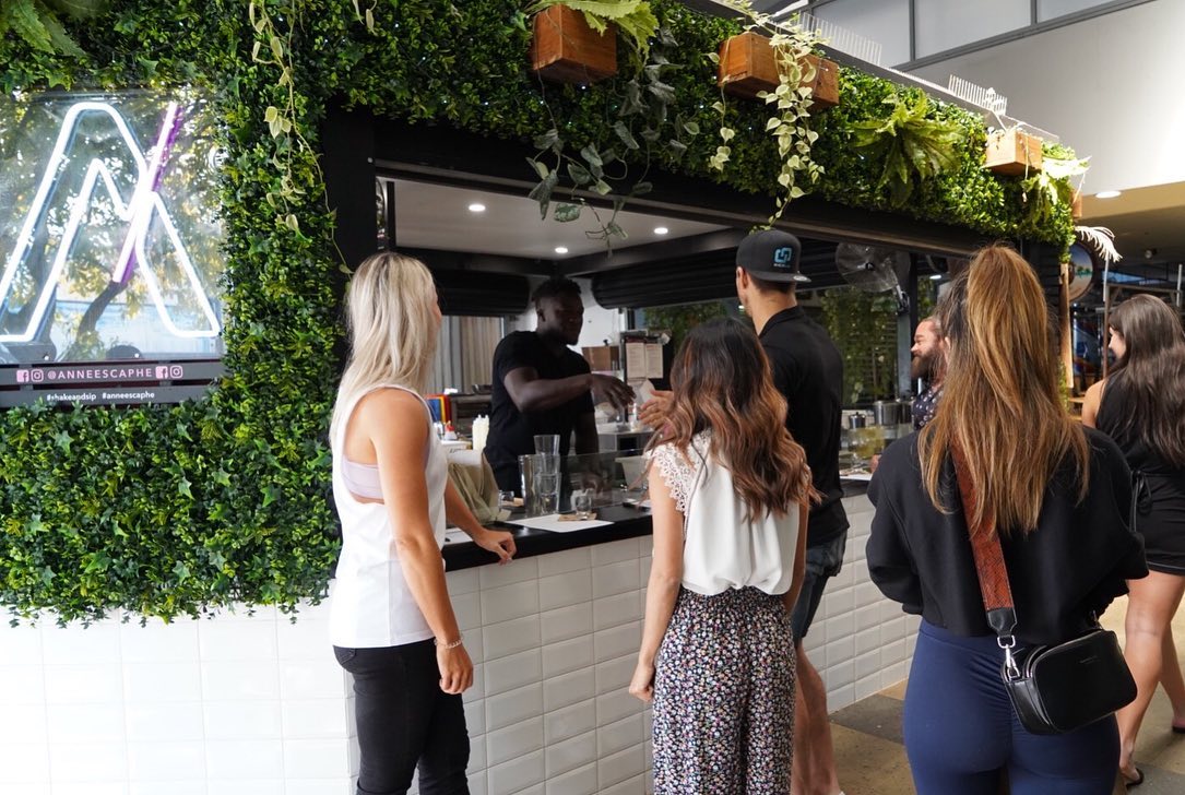 A shot of customers gathering around Annee's Caphe's Grafton Street store