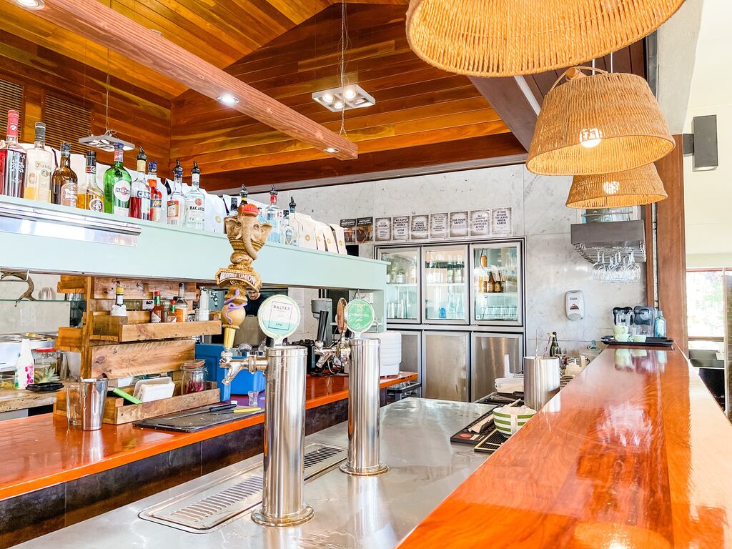 An interior shot of the cafe bar and coffee machine